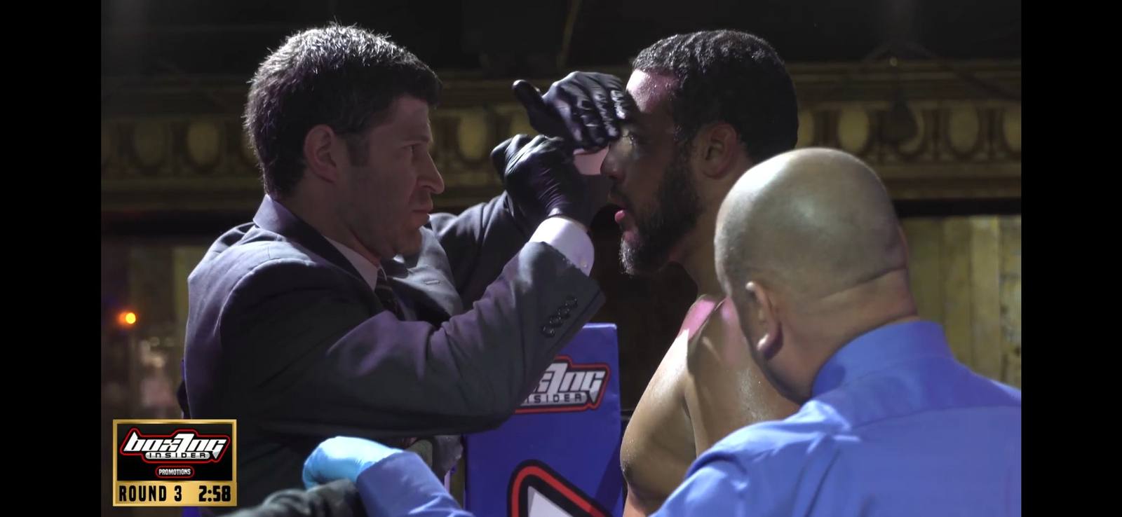 Dr. Goldwaser examining a boxer at ringside