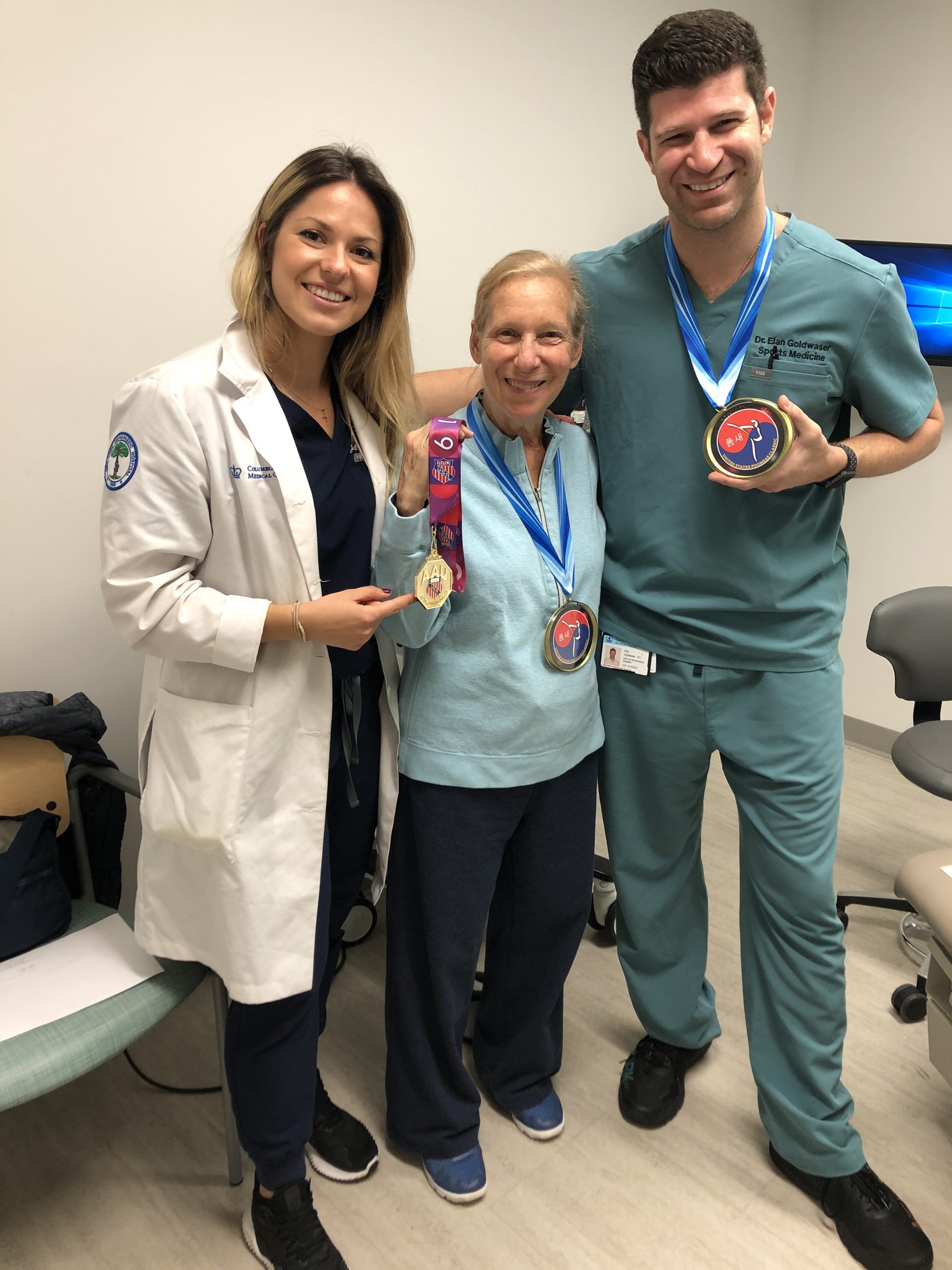 Athlete with medals after recovery