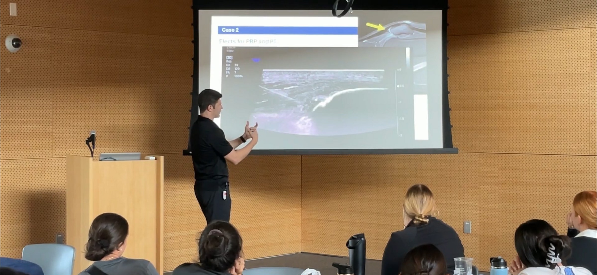 Dr. Goldwaser presenting ultrasound case images